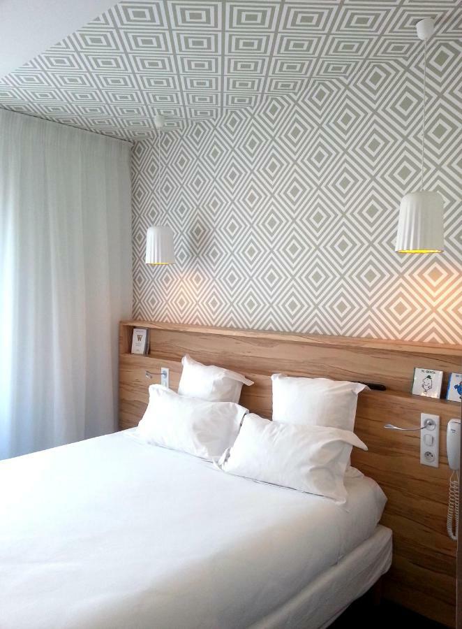 Hotel Et Apparts Marin ลาวาล ภายนอก รูปภาพ